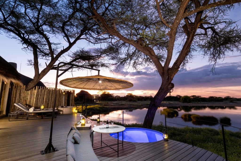Sunset view from a luxury suite at Onguma Camp Kala - Onguma Game Reserve, Namibia, Africa